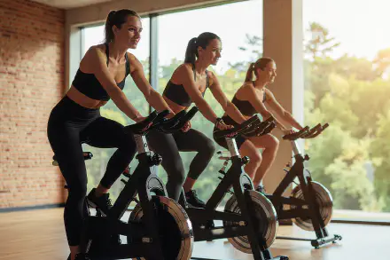 Learn how to nail your first spin class: from bike setup, hydration, and resistance tips to the science-backed mood and cardio benefits of indoor cycling.